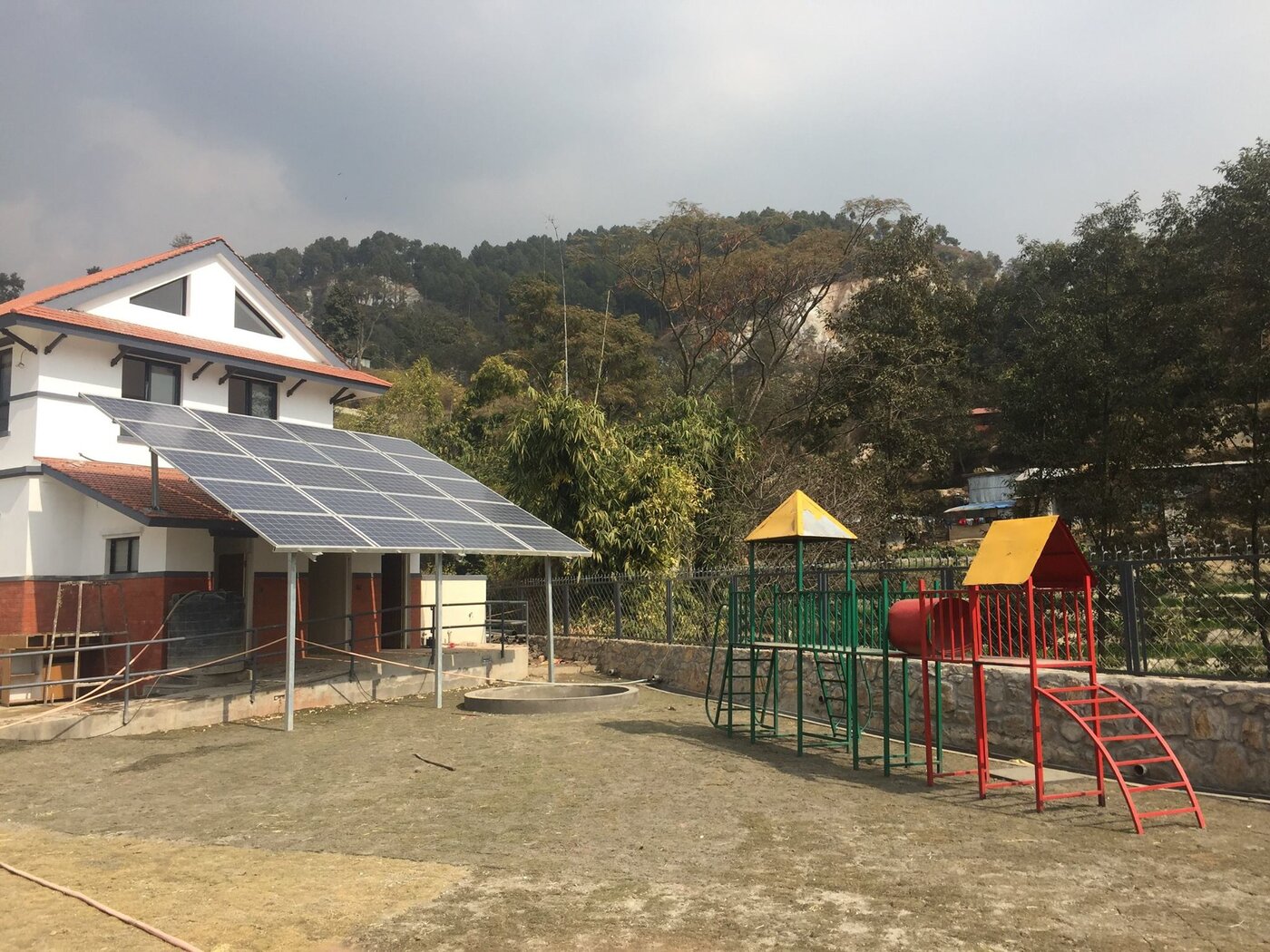 The Butterfly Home building with rooftop solar array
