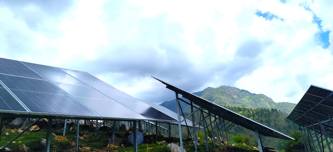 Wide view of the Kankasundari solar array with the Karnali hills behind